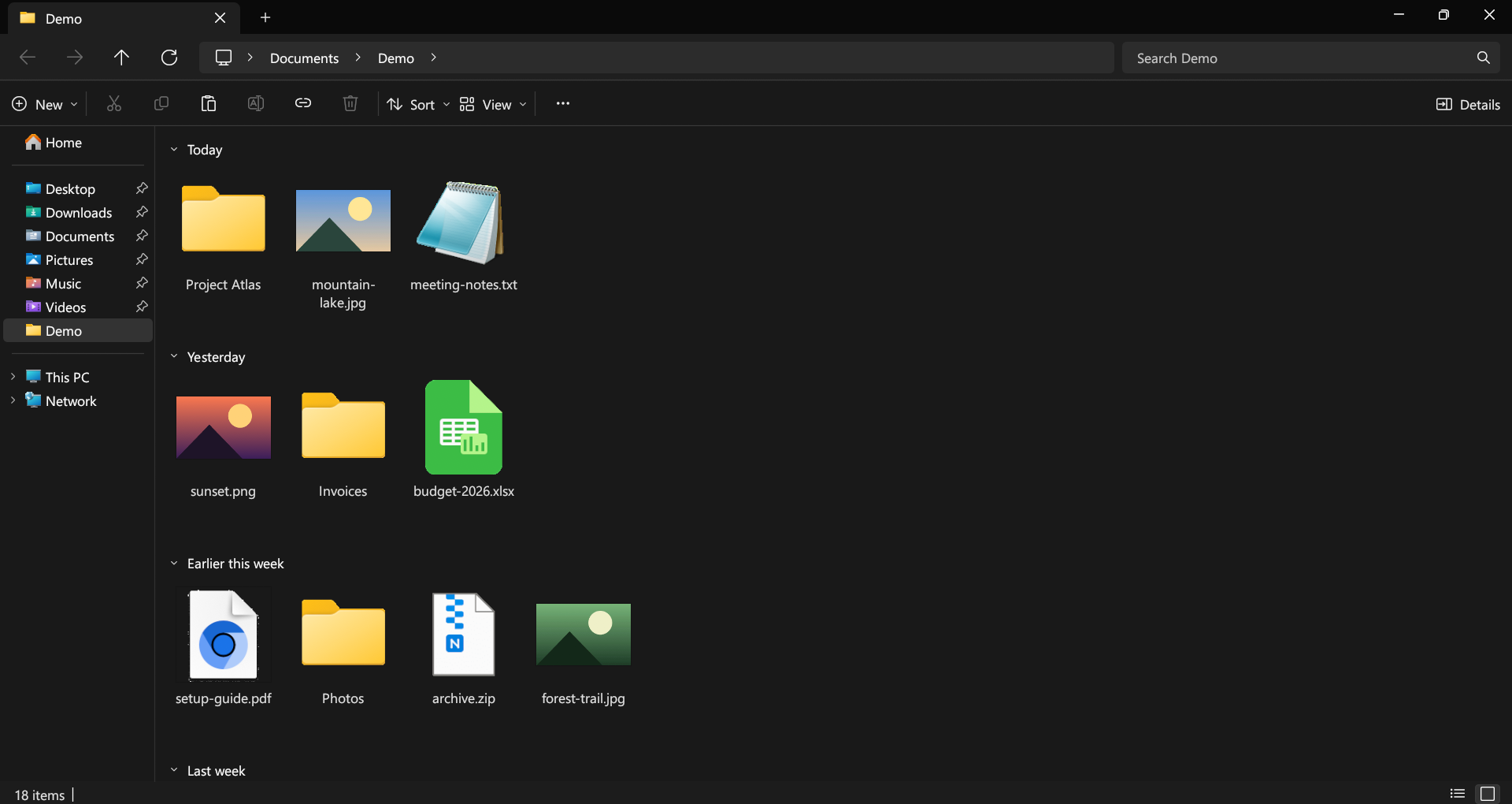Swift Explorer showing a Downloads folder with large icons, grouped by date